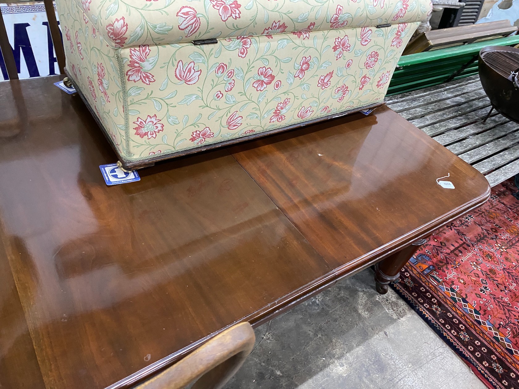A Victorian mahogany extending dining table on turned legs, length 302cm extended (two spare leaves), depth 120cm, height 73cm